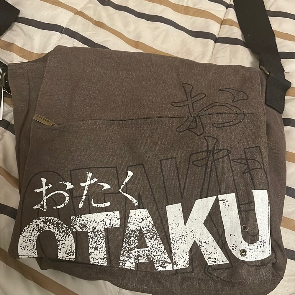Brown Otkau messenger bag.